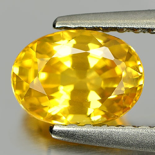 Yellow Sapphire 1.43 Ct. VVS Oval Shape 7 x 5.2 Mm. Natural Gemstone From Thailand: Product ID: 806160917 Product Name: Natural Yellow Sapphire Weight: 1.43 CT. Size: 7 x 5.2 x 4.2 MM. Shape: Oval Color: Yellow Clarity:VVS Luster: Very Good Gems Origin: Thailand Treatment: Heated Cry