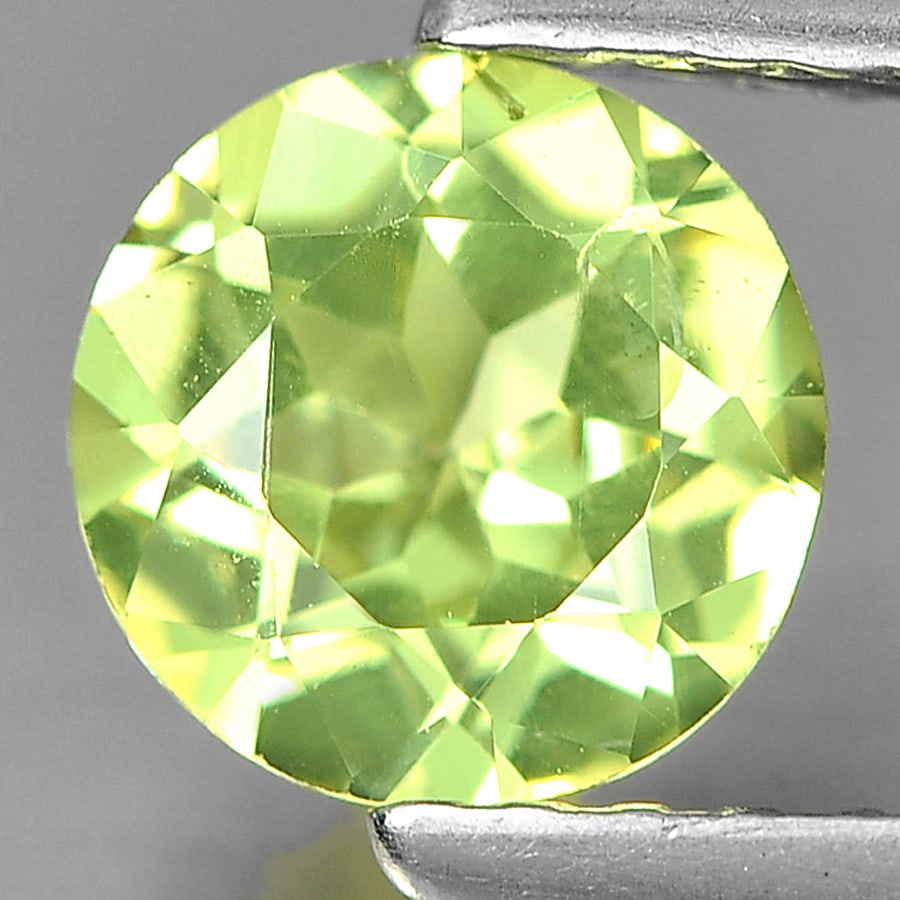 Natural Greenish Yellow Mali Garnet 0.88 Ct. Round Shape 6.2 Mm. Unheated Gemstone From Madagascar: Product ID: 802936132 Product Name: Natural Mali Garnet Weight: 0.88 CT. Size: 6.2 x 3.4 MM. Shape: Round Color: Yellow Clarity:SI1 Luster: Very Good Gems Origin: Madagascar Treatment: Unheated Crysta