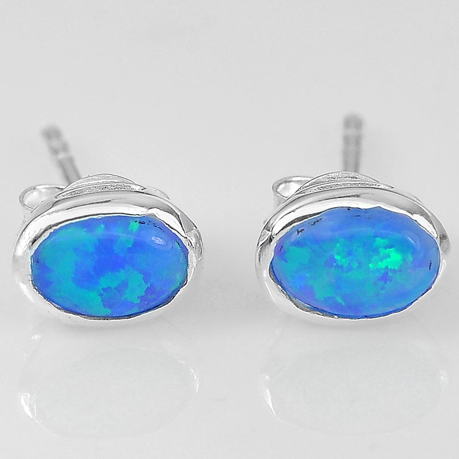 925 Sterling Silver Multi Color Blue Created Opal Stud Earrings 0.78 Grams: Product ID: 280220014 Product Type: 925 Sterling Silver Fine Jewelry Jewelry Weight: 0.78 Grams. Gemstones Color: Blue Metal: Solid Silver 92.5%. Gemstone Detail: Average Range 0.71 - 0.88 Grams Per 1