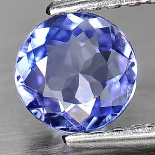Natural Violetish Blue Tanzanite 0.46 Ct. VVS Round Shape Size 5.1 Mm. Gemstone From Tanzania: Product ID: 807008332 Product Name: Natural Tanzanite Weight: 0.46 CT. Size: 5.1 x 5.1 x 2.5 MM. Shape: Round Color: Violetish Blue Clarity:VVS Luster: Good Gems Origin: Tanzania Treatment: Heated Cry