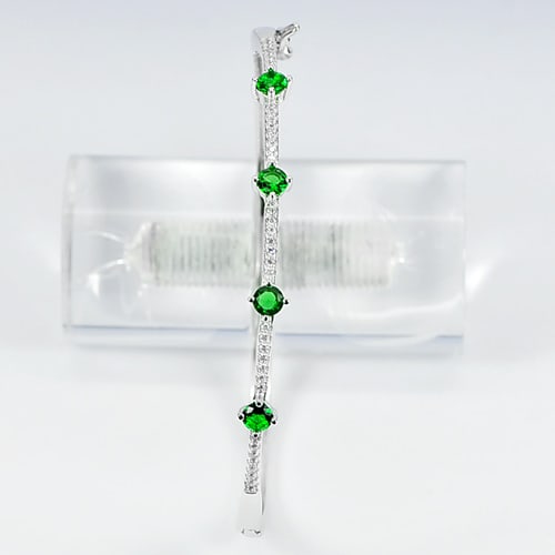 925 Sterling Silver Jewelry Bangle with Round Green CZ Diameter 58 mm.: Product ID: 280550074 Product Type: 925 Sterling Silver Fine Jewelry Jewelry Weight: 10.00 Grams. Gemstones Color: Silver Metal: Solid Silver 92.5%. Gemstone Detail: Round Green CZ Size 4 x 4 mm. 1 Pc