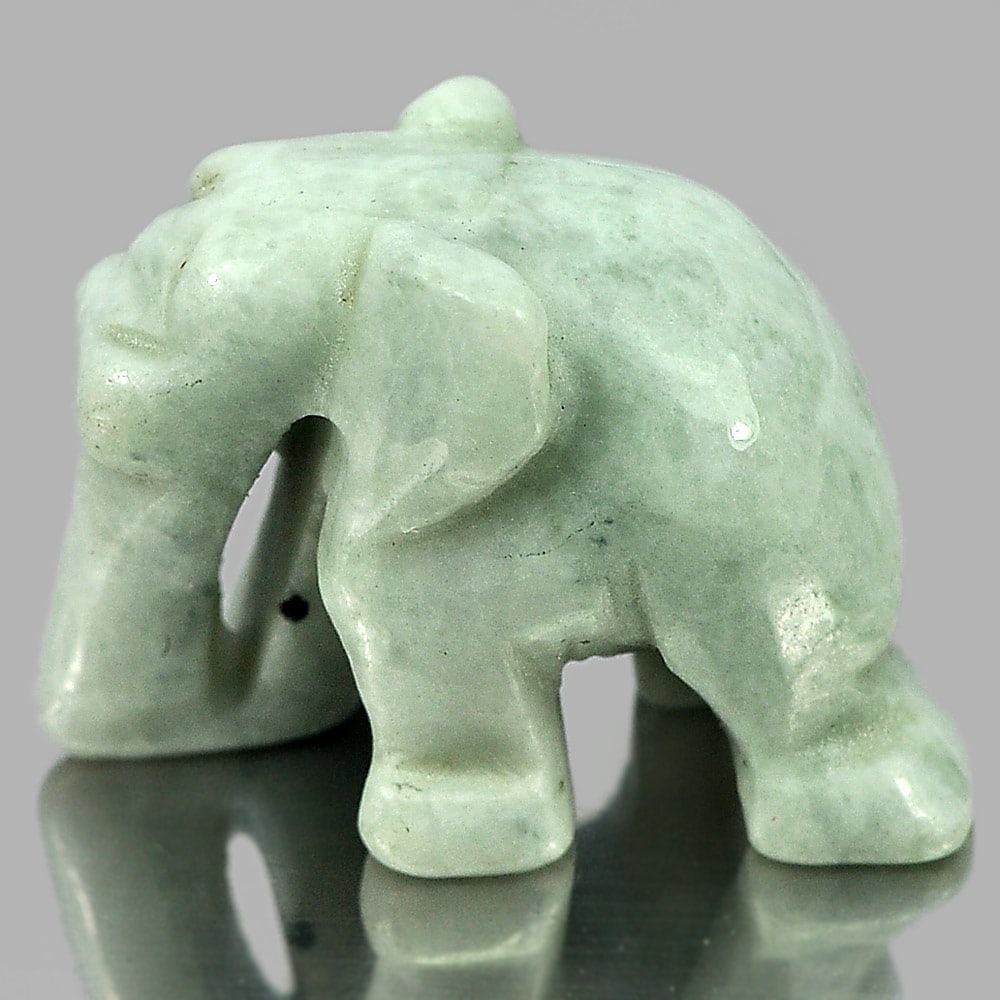 Green White Jade 44.79 Ct. Elephant Carving Size 25 x 18 Mm. Natural Gemstone From Thailand: Product ID: 819813005 Product Name: Natural Jade Weight: 44.79 CT. Size: 25 x 18 x 14 MM. Shape: Elephant Carving Color: Green Clarity:Opaque Luster: Good Gems Origin: Thailand Treatment: Unheated Cry