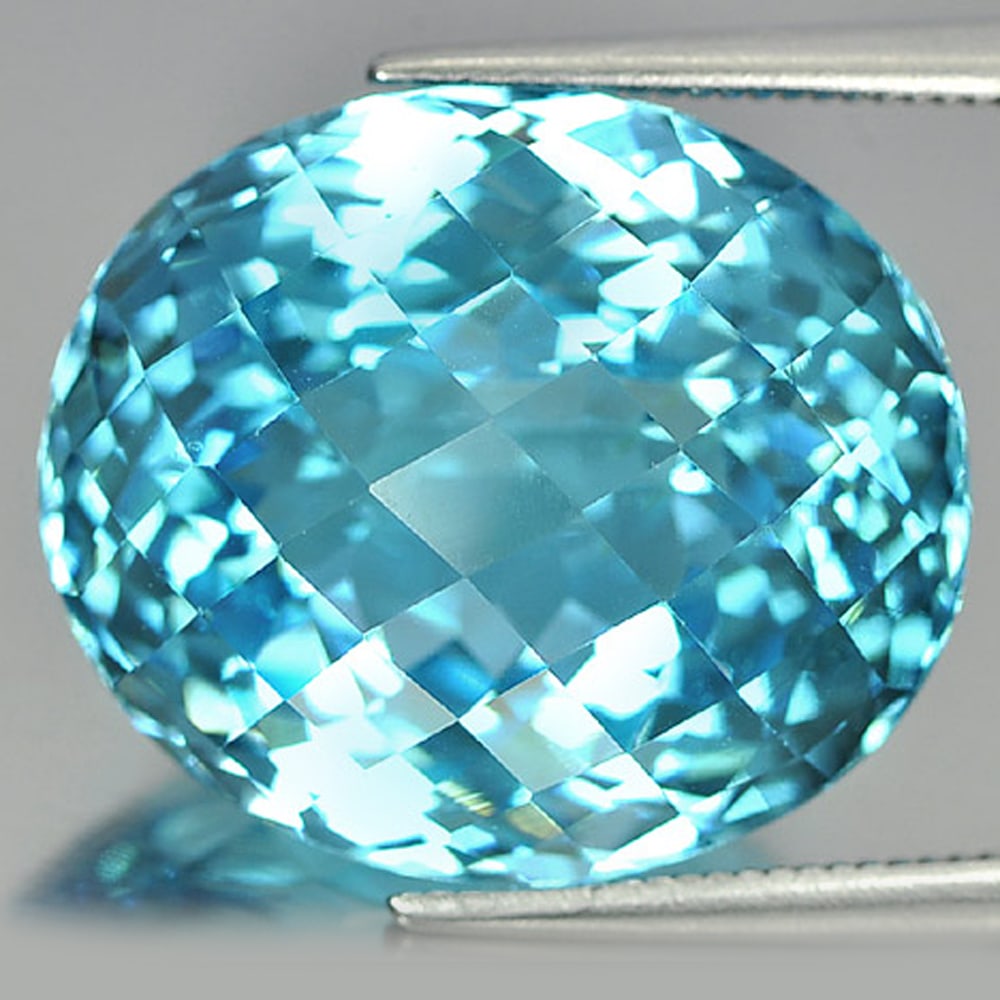 Natural Swiss Blue Topaz 24.21 Ct. VVS Oval Checkerboard Cut Shape 18 x 15.5 Mm. Gemstone From (1 of 3)