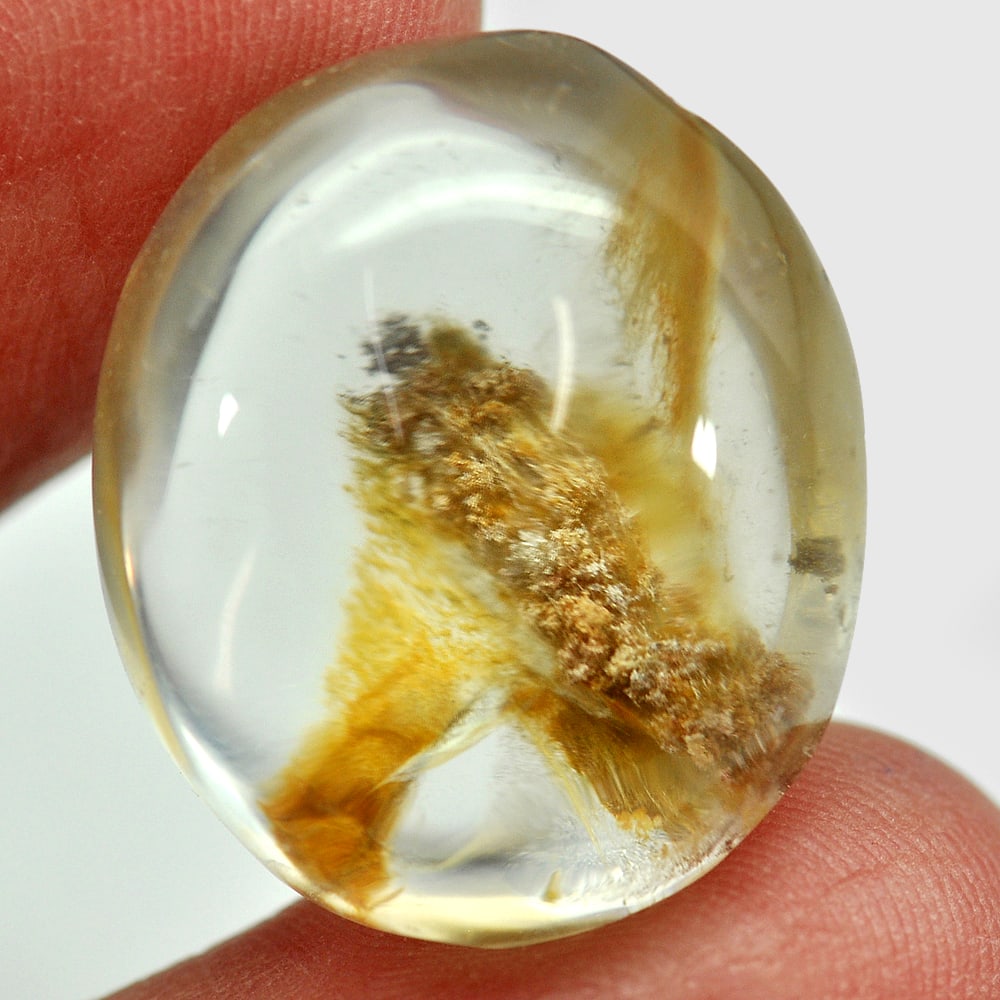 Natural Moss Quartz 29.60 Ct. Oval Cabochon Shape 22 x 18.3 Mm. Unheated Gemstone From Thailand: Product ID: 805529403 Product Name: Natural Quartz Weight: 29.60 CT. Size: 22 x 18.3 x 11.3 MM. Shape: Oval Cabochon Color: White Clarity:Semi - Transparent Luster: Good Gems Origin: Thailand Treatmen