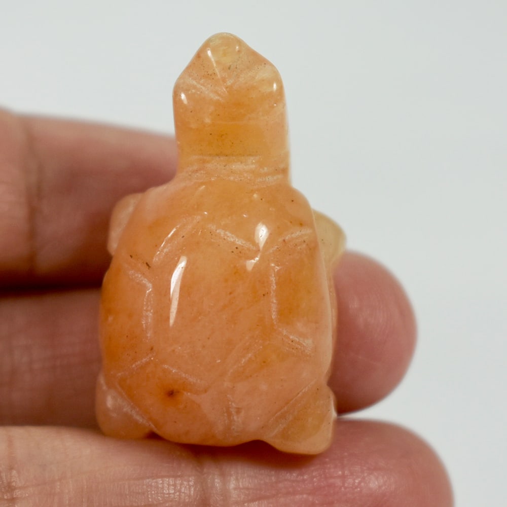 Natural Genuine Burmese Jade 75.44 Ct. Turtle Carving Shape 22 x 34 Mm.: Product ID: 818102500 Product Name: Natural Gemstones Weight: 77.55 CT. Size: 22 x 34 x 15 MM. Shape: Caving Color: multi Color brown Honey Clarity:Opaque Luster: Good Gems Origin: Burma Treatment: Un