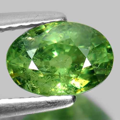 Certified Green Demantoid Garnet 1.95 Ct. Oval Shape 8.38 x 5.82 Mm. Natural Gemstone From: Product ID: 802913303 Product Name: Natural Demantoid Weight: 1.95 CT. Size: 8.38 x 5.82 x 4.82 MM. Shape: Oval Color: Green Clarity:SI1 Luster: Very Good Gems Origin: Madagascar Treatment: Unheated C