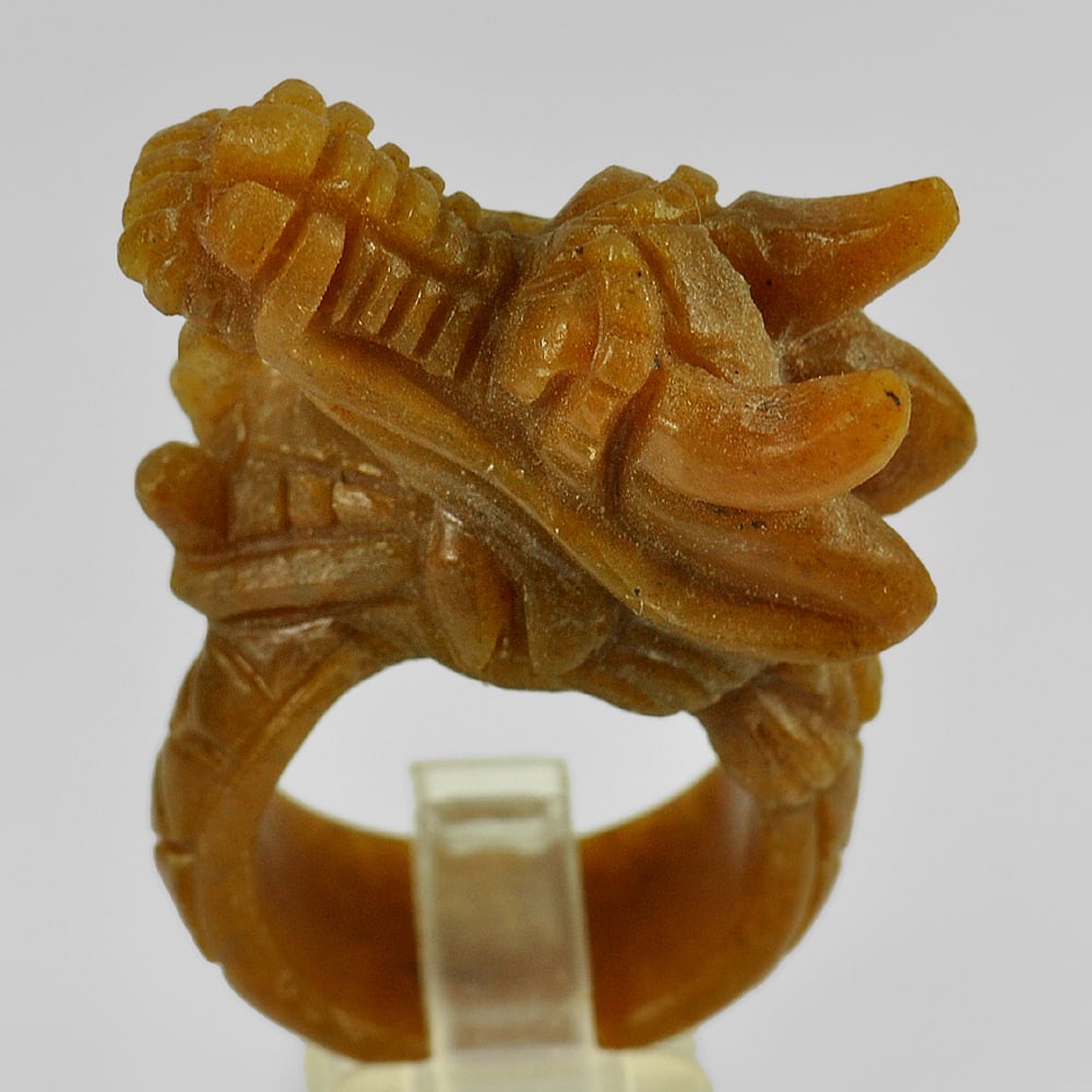 Brown Jade 73.11 Ct. Dragon Carving Ring Shape 40 x 20 Mm. Natural Unheated Gemstone Size 8: Product ID: 819814568 Product Name: Natural Jade Weight: 73.11 CT. Size: 40 x 20 MM. Shape: Dragon Color: Brown Clarity:Opaque Luster: Good Gems Origin: Thailand Treatment: Unheated Crystal Structure: