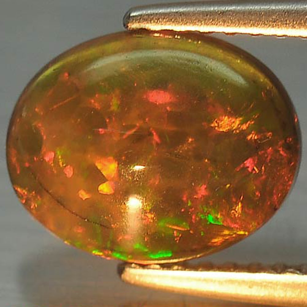 Play Of Color Rainbow Fire Red Black Opal 1.49 Ct. Oval Cabochon Shape 10 x 8 Mm. Natural Gemstone (1 of 3)