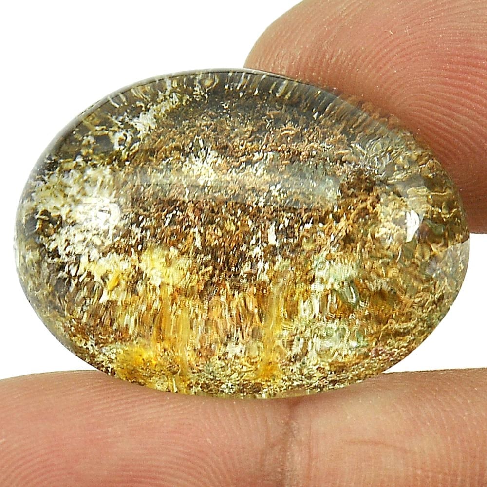 Brown White Moss Quartz 55.84 Ct. Oval Cabochon Shape 28 x 21 Mm. Natural Gemstone From Thailand: Product ID: 805529222 Product Name: Natural Quartz Weight: 55.84 CT. Size: 28 x 21 x 12 MM. Shape: Oval Cabochon Color: White Clarity:Semi - Transparent Luster: Good Gems Origin: Thailand Treatment: U