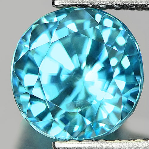 Blue Zircon 3.99 Ct. Round Shape 7.7 Mm. Natural Gemstone From Cambodia: Product ID: 807723514 Product Name: Natural Zircon Weight: 3.99 CT. Size: 7.7 x 7.7 x 6.5 MM. Shape: Round Color: Blue Clarity:SI Luster: Good Gems Origin: Cambodia Treatment: Heated Crystal Structure