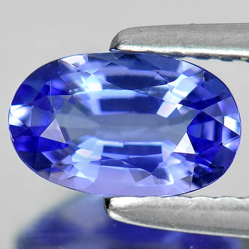 Violet Blue Tanzanite 0.88 Ct. Clean Oval Shape 7.9 x 4.9 Mm. Natural Gemstone From Tanzania: Product ID: 807004505 Product Name: Natural Tanzanite Weight: 0.88 CT. Size: 7.9 x 4.9 x 3.1 MM. Shape: Oval Color: Violet Blue Clarity:IF Luster: Good Gems Origin: Tanzania Treatment: Heated Crystal 