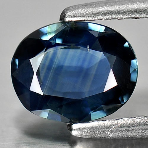 Certified Unheated Blue Sapphire 1.05 Ct. Oval Shape 5.84 x 7.32 Mm. Natural Gemstone From Thailand: Product ID: 806010300 Product Name: Natural Blue Sapphire Weight: 1.05 CT. Size: 5.84 x 7.32 x 2.44 MM. Shape: Oval Color: Blue Clarity:VSI Luster: Good Gems Origin: Thailand Treatment: Unheated Cryst