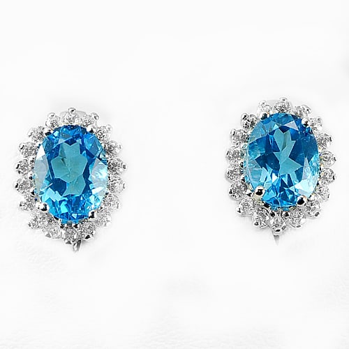 Natural Swiss Blue Topaz 925 Sterling Silver Jewelry 4.17 Grams Earrings Size 13 x 11.5 Mm.: Product ID: 281020146 Product Name: Natural Fashion Jewelry Weight: 4.17 CT. Size: 13 x 11.5 Mm. MM. Shape: Oval Color: Blue Clarity:VVS Luster: Very Good Gems Origin: Thailand Treatment: Treated Crys