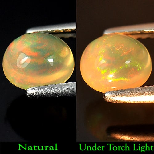 Multi Color Opal 0.84 Ct. Oval Cabochon Shape 6.8 x 6.1 Mm. Natural Gemstone From Ethiopia: Product ID: 818715651 Product Name: Natural Opal Weight: 0.84 CT. Size: 6.8 x 6.1 x 4.3 MM. Shape: Oval Cabochon Color: Multi Color Clarity:Opaque Luster: Good Gems Origin: Ethiopia Treatment: Unheate