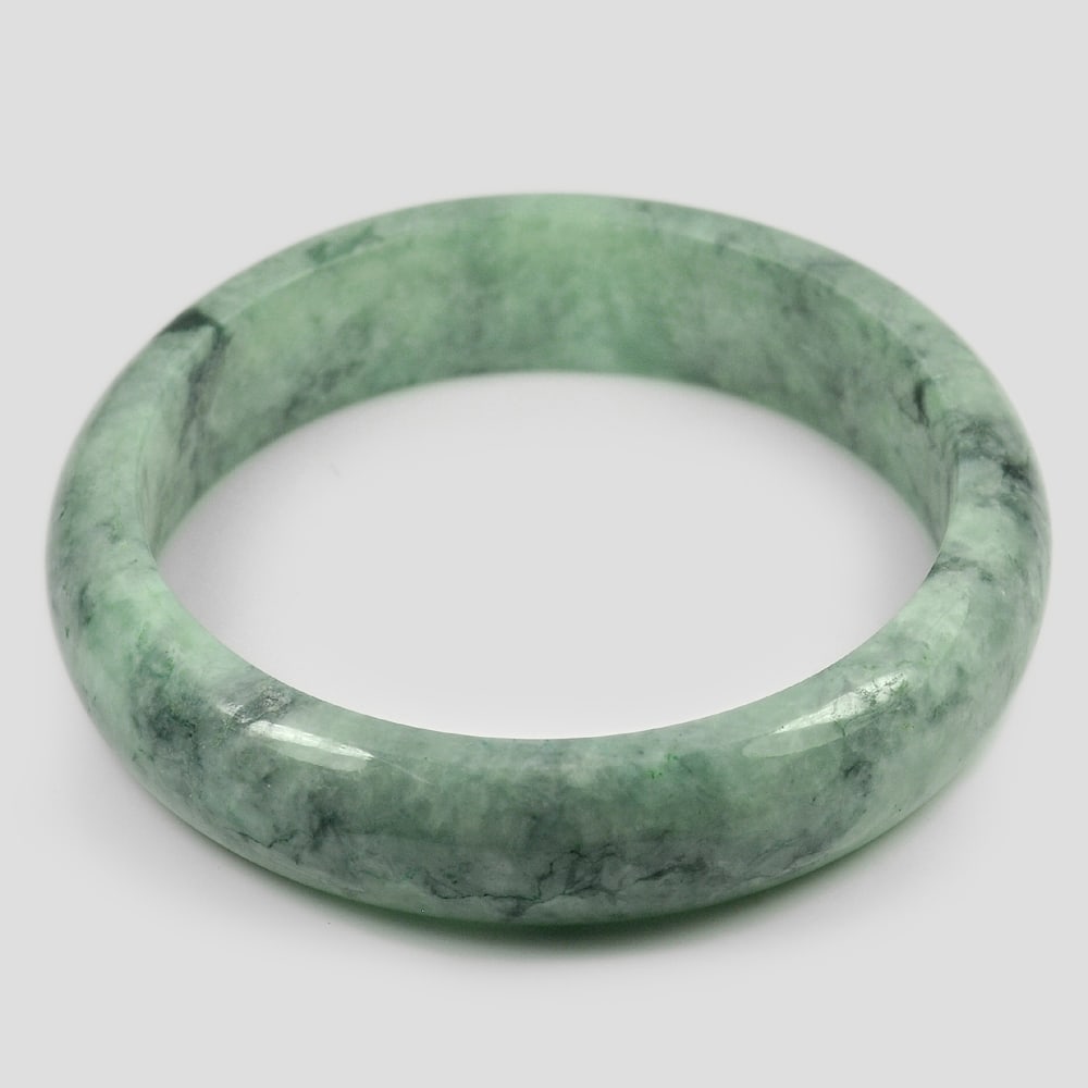 Green Jade Bangle 389 Ct. Size 80 x 65 x 16 Mm. Natural Gemstone Unheated: Product ID: 819814250 Product Name: Natural Jade Weight: 389.00 CT. Size: 80 x 65 x 16 MM. Shape: Round Color: Green Clarity:Opaque Luster: Good Gems Origin: Thailand Treatment: Unheated Crystal Struc