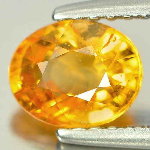 Natural Yellow Sapphire 1.33 Ct. Oval Shape 6.8 x 5.5 Mm. Gemstone From Thailand: Product ID: 806139977 Product Name: Natural Yellow Sapphire Weight: 1.33 CT. Size: 6.8 x 5.5 x 4 MM. Shape: Oval Color: Yellow Clarity:SI Luster: Good Gems Origin: Thailand Treatment: Heated Crystal S