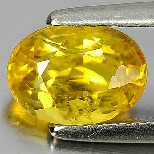 Yellow Sapphire 1.84 Ct. Oval Shape 8.2 x 6.1 Mm. Natural Gemstone From Thailand: Product ID: 806152997 Product Name: Natural Yellow Sapphire Weight: 1.84 CT. Size: 8.2 x 6.1 x 4.4 MM. Shape: Oval Color: Yellow Clarity:SI1 Luster: Good Gems Origin: Thailand Treatment: Heated Crysta