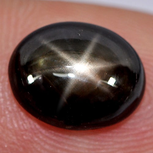 Natural Black Star Sapphire 4.07 Ct. Oval Cabochon Shape 10.4 x 8.2 Mm. Gemstone From Thailand: Product ID: 806135091 Product Name: Natural Star Sapphire Weight: 4.07 CT. Size: 10.4 x 8.2 x 4.4 MM. Shape: Oval Cabochon Color: Black Clarity:Opaque Luster: Good 6 Rays Star Gems Origin: Thailand Tr
