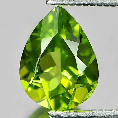 Natural Green Peridot 1.73 Ct. Pear Shape 9.2 x 7 Mm. Gemstone From Pakistan: Product ID: 805313606 Product Name: Natural Peridot Weight: 1.73 CT. Size: 9.2 x 7 x 4.4 MM. Shape: Pear Color: Green Clarity:VSI Luster: Good Gems Origin: Pakistan Treatment: Unheated Crystal Structu