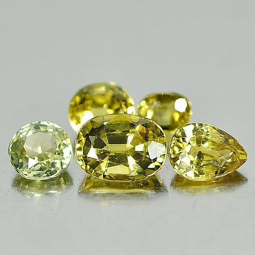 Natural Yellow Sapphire 1.75 Ct. 5 Pcs. Mix Shape 3.3 x 2.7 Mm. Gemstone From Thailand: Product ID: 806152087 Product Name: Natural Yellow Sapphire Weight: 1.75 CT. Size: 3.3 x 2.7 x 2to5.6 x 4.2 x 3 MM. Shape: Mix Shape Color: Yellow Clarity:VSI Luster: Good Gems Origin: Thailand Treatm