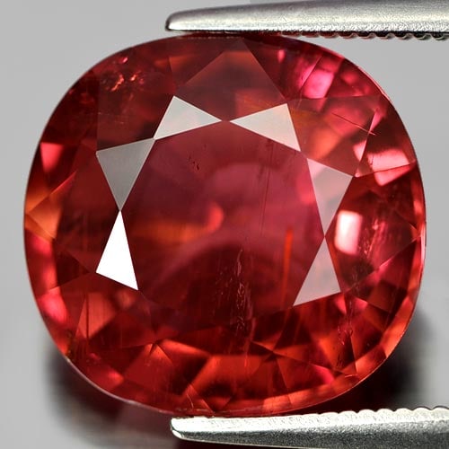 Natural Vivid Red Pink Tourmaline 8.14 Ct. Cushion Shape 13 x 12.5 Mm. Unheated Gemstone From: Product ID: 807241069 Product Name: Natural Tourmaline Weight: 8.14 CT. Size: 13 x 12.5 x 7.2 MM. Shape: Cushion Color: Red Pink Clarity:SI Luster: Very Good Gems Origin: Nigeria Treatment: Unheated C