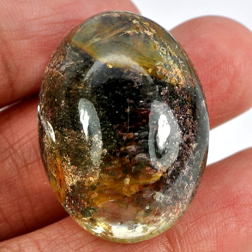 Natural White Brown Moss Quartz 77.39 Ct. Oval Cabochon Shape 32 x 23 Mm. Unheated Gemstone: Product ID: 819601015 Product Name: Natural Quartz Weight: 77.39 CT. Size: 32 x 23 x 16 MM. Shape: Oval Cabochon Color: White Brown Clarity:Semi - Transparent Luster: Good Gems Origin: Thailand Treatm