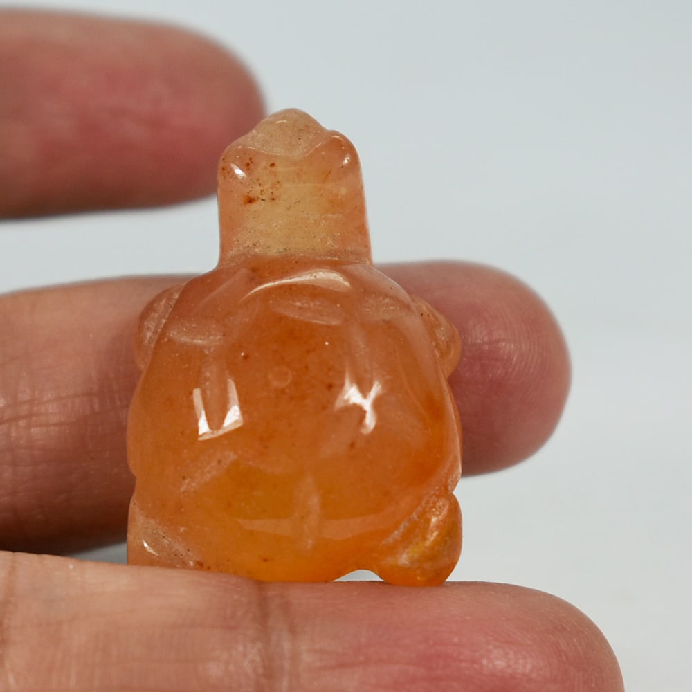 Natural Honey Jade 59.84 Ct. Turtle Carving Size 22 x 32 x 13 Mm.: Product ID: 818102498 Product Name: Natural Gemstones Weight: 59.84 CT. Size: 22 x 32 x 13 MM. Shape: Caving Color: multi Color brown Honey Clarity:Opaque Luster: Good Gems Origin: Burma Treatment: Un