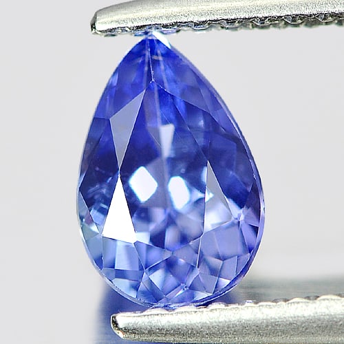 Violet Blue Tanzanite 0.88 Ct. Clean Pear Shape 7.6 x 5.6 Mm. Natural Gemstone: Product ID: 807004617 Product Name: Natural Tanzanite Weight: 0.88 CT. Size: 7.6 x 5.6 x 3.5 MM. Shape: Pear Color: Violet Blue Clarity:IF Luster: Good Gems Origin: Tanzania Treatment: Heated Crystal 
