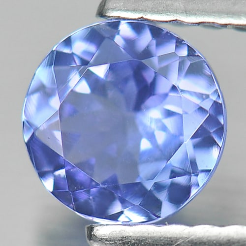 Violetish Blue Tanzanite 0.63 Ct. Round Shape 5.5 Mm. Natural Gemstone From Tanzania: Product ID: 807009495 Product Name: Natural Tanzanite Weight: 0.63 CT. Size: 5.5 x 5.5 x 3 MM. Shape: Round Color: Violetish Blue Clarity:VSI Luster: Good Gems Origin: Tanzania Treatment: Heated Cryst