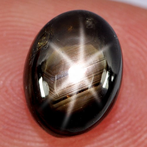 Natural Black Star Sapphire 4.91 Ct. Oval Cabochon Shape 10.1 x 7.6 Mm. Natural Gemstone From: Product ID: 806155138 Product Name: Natural Star Sapphire Weight: 4.91 CT. Size: 10.1 x 7.6 x 5.4 MM. Shape: Oval Cabochon Color: Black Clarity:Opaque Luster: Good 6 Rays Star Gems Origin: Thailand Tr