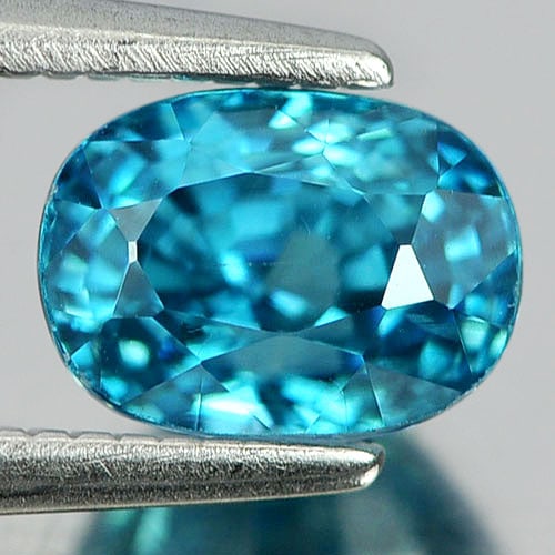 Natural Blue Zircon 1.97 Ct. Oval Shape 6.8 x 5 Mm. Gemstone From Cambodia: Product ID: 807728958 Product Name: Natural Zircon Weight: 1.97 CT. Size: 6.8 x 5 x 5.3 MM. Shape: Oval Color: Blue Clarity:VSI Luster: Good Gems Origin: Cambodia Treatment: Heated Crystal Structure: 