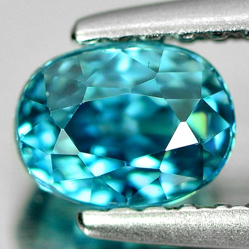 Natural Blue Zircon 1.08 Ct. Oval Shape 5.8 x 4.4 Mm. Gemstone From Cambodia: Product ID: 807727640 Product Name: Natural Zircon Weight: 1.08 CT. Size: 5.8 x 4.4 x 4.1 MM. Shape: Oval Color: Blue Clarity:VSI Luster: Good Gems Origin: Cambodia Treatment: Heated Crystal Structure