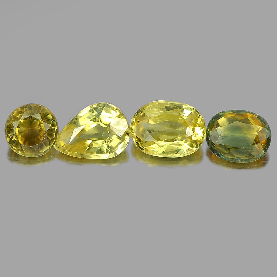 Natural Yellow Sapphire 1.90 Ct. Mix Shape 4 Pcs. Gemstones From Thailand: Product ID: 806152064 Product Name: Natural Yellow Sapphire Weight: 1.90 CT. Size: 4.9 x 3.9 x 2to5.9 x 4.3 x 2.6 MM. Shape: Pear,Oval Color: Yellow Clarity:VSI Luster: Good Gems Origin: Thailand Trea