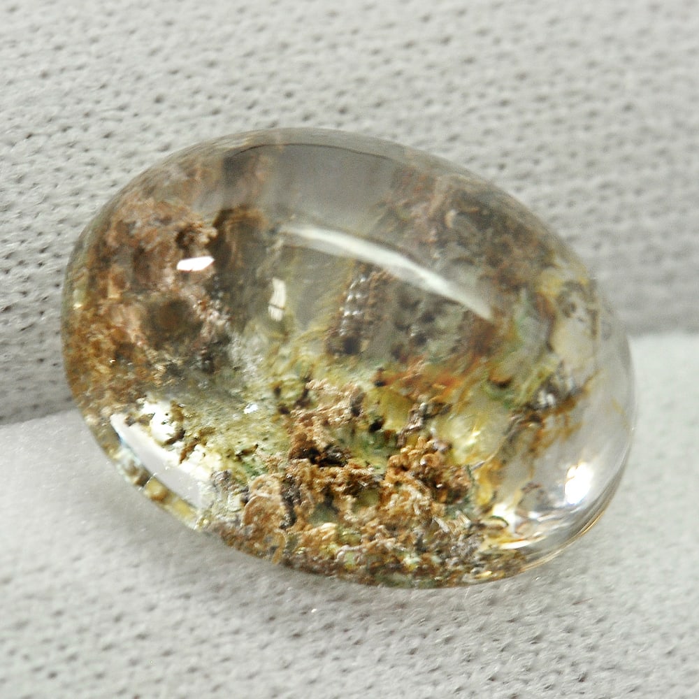 Natural White Brown Moss Quartz 10.16 Ct. Oval Cabochon Shape 15.5 x 11.9 Mm. Gemstone From Thailand: Product ID: 805529569 Product Name: Natural Quartz Weight: 10.16 CT. Size: 15.5 x 11.9 x 8.2 MM. Shape: Oval Cabochon Color: White Clarity:Semi - Transparent Luster: Good Gems Origin: Thailand Treatme