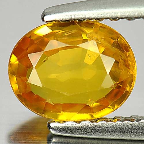 Natural Yellow Sapphire 0.90 Ct. Oval Shape 6.7 x 5.4 Mm. Gemstone From Thailand: Product ID: 806158718 Product Name: Natural Yellow Sapphire Weight: 0.90 CT. Size: 6.7 x 5.4 x 2.6 MM. Shape: Oval Color: Yellow Clarity:VSI Luster: Good Gems Origin: Thailand Treatment: Heated Crysta