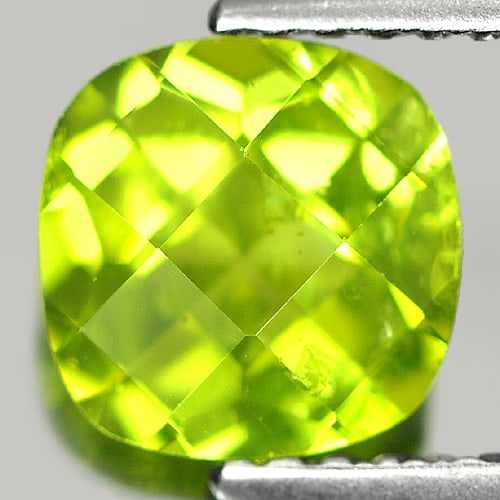 Natural Green Peridot 1.26 Ct. Cushion Checkerboard Cut Shape 7.2 Mm. Gemstone: Product ID: 805303453 Product Name: Natural Peridot Weight: 1.26 CT. Size: 7.2 x 7.2 x 4.1 MM. Shape: Cushion Checkerboard Color: Green Clarity:SI Luster: Good Gems Origin: Thailand Treatment: Unheate