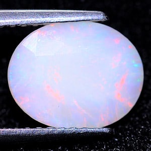 Natural Multi Color Opal 1.67 Ct. Oval Shape 10.2 x 8.2 Mm. Gemstone Unheated: Product ID: 818708215 Product Name: Natural Opal Weight: 1.67 CT. Size: 10.2 x 8.2 x 4.9 MM. Shape: Oval Color: Multi Color Clarity:Semi - Transparent Luster: Iridescent Gems Origin: Ethiopia Treatmen