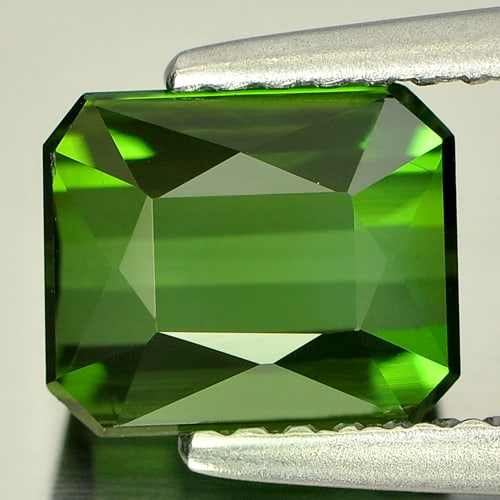 Natural Green Tourmaline 1.78 Ct. VVS Octagon Shape 7.2 x 6 Mm. Gemstone From Nigeria: Product ID: 807240550 Product Name: Natural Tourmaline Weight: 1.78 CT. Size: 7.2 x 6 x 4.5 MM. Shape: Octagon Color: Green Clarity:VVS Luster: Good Gems Origin: Nigeria Treatment: Unheated Crystal St