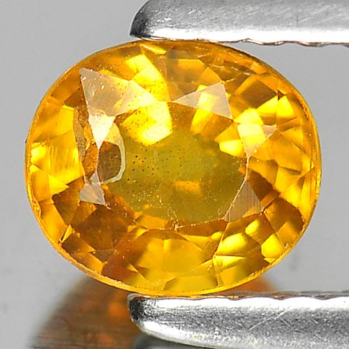 Natural Yellow Sapphire 0.80 Ct. Oval Shape 5.8 x 5 Mm. Gemstone From Thailand: Product ID: 806158747 Product Name: Natural Yellow Sapphire Weight: 0.80 CT. Size: 5.8 x 5 x 3.2 MM. Shape: Oval Color: Yellow Clarity:VSI Luster: Good Gems Origin: Thailand Treatment: Heated Crystal 