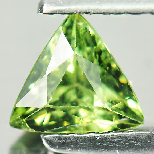 Natural Green Demantoid Garnet 0.67 Ct. Trilliant Shape 5.7 x 5.4 Mm. Unheated Gemstone From: Product ID: 802915822 Product Name: Natural Demantoid Weight: 0.67 CT. Size: 5.7 x 5.4 x 3.5 MM. Shape: Trilliant Color: Green Clarity:VSI Luster: Good Gems Origin: Madagascar , Africa Treatment: Unhe