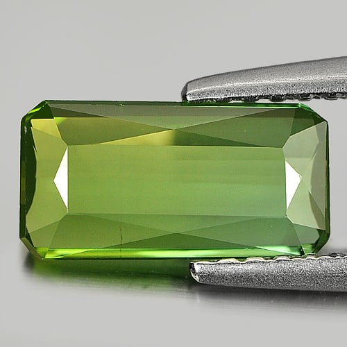 Natural Yellowish Green Tourmaline 1.02 Ct. VVS Octagon Shape 9.6 x 5 Mm. Gemstone From Nigeria: Product ID: 807237940 Product Name: Natural Tourmaline Weight: 1.02 CT. Size: 9.6 x 5 x 2.2 MM. Shape: Octagon Color: Yellowish Green Clarity:VVS Luster: Good Gems Origin: Nigeria Treatment: Unheated 