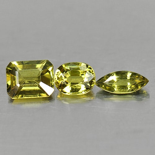 Natural Yellow Sapphire 1.75 Ct. Mix Shape 3 Pcs. 6 x 5 Mm. Gemstone From Thailand: Product ID: 806152057 Product Name: Natural Yellow Sapphire Weight: 1.75 CT. Size: 6 x 5 x 2.7 MM. Shape: Mix Shape Color: Yellow Clarity:VSI Luster: Good Gems Origin: Thailand Treatment: Heated Cryst
