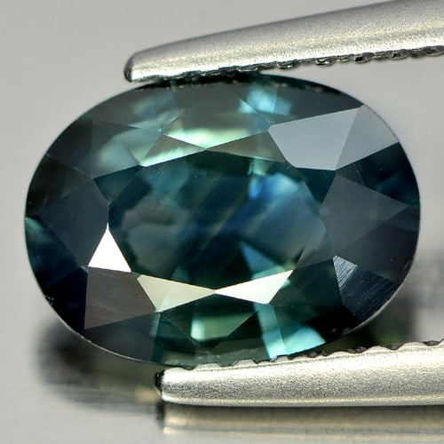 Certified Natural Greenish Blue Sapphire 2.08 Ct. VVS Oval Shape 9.07 x 6.68 Mm. Gemstone: Product ID: 806143018 Product Name: Natural Blue Sapphire Weight: 2.08 CT. Size: 9.07 x 6.68 x 3.95 MM. Shape: Oval Color: Greenish Blue Clarity:VVS Luster: Very Good Gems Origin: Thailand Treatment: 