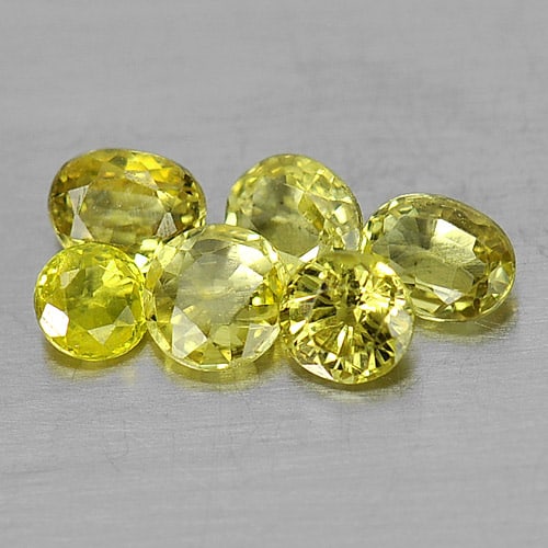 Yellow Sapphire 1.40 Ct. 6 Pcs. Mix Shape Natural Gemstone From Thailand: Product ID: 806152045 Product Name: Natural Yellow Sapphire Weight: 1.40 CT. Size: 3 x 3 x 1.6to4.2 x 3.3 x 2 MM. Shape: Round,Oval Color: Yellow Clarity:VSI Luster: Good Gems Origin: Thailand Treatme
