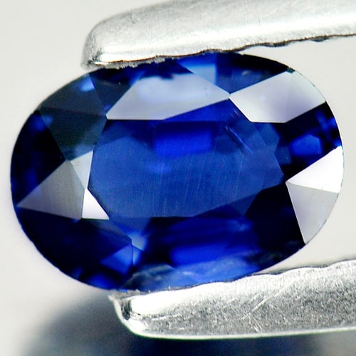 Certified Blue Sapphire 0.63 Ct. Oval Shape 6.05 x 4.25 Mm. Natural Gemstone From Thailand: Product ID: 806007408 Product Name: Natural Blue Sapphire Weight: 0.63 CT. Size: 6.05 x 4.25 x 2.65 MM. Shape: Oval Color: Blue Clarity:SI Luster: Good Gems Origin: Thailand Treatment: Heated Crystal 