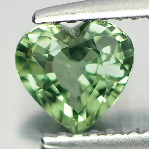 Green Sapphire 0.93 Ct. Clean Heart Shape 6.6 x 6.4 Mm. Natural Gemstone From Thailand: Product ID: 806146475 Product Name: Natural Green Sapphire Weight: 0.93 CT. Size: 6.6 x 6.4 x 3.4 MM. Shape: Heart Color: Green Clarity:IF Luster: Very Good Gems Origin: Thailand Treatment: Heated Cry