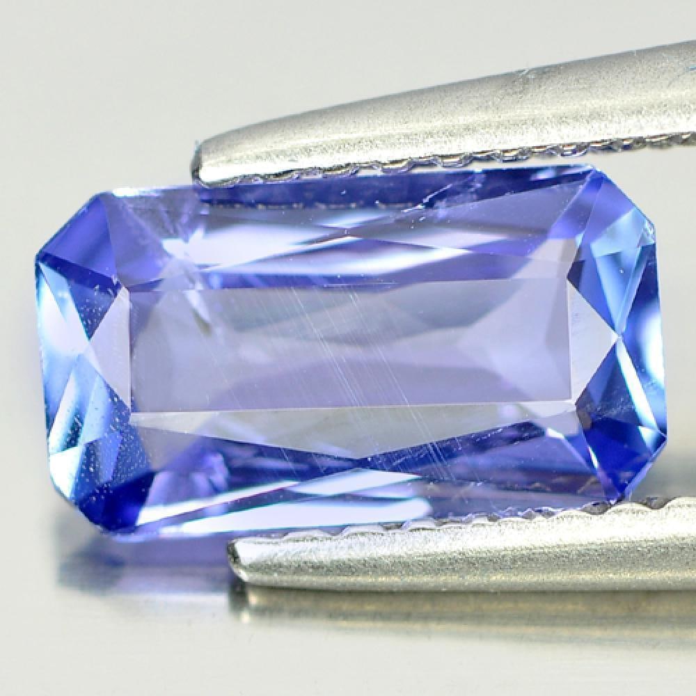 Violetish Blue Tanzanite 1.18 Ct. Octagon Shape 9 x 5 Mm. Natural Gemstone From Tanzania: Product ID: 807005401 Product Name: Natural Tanzanite Weight: 1.18 CT. Size: 9 x 5 x 2.9 MM. Shape: Octagon Color: Purple Clarity:VSI Luster: Good Gems Origin: Tanzania Treatment: Heated Crystal Struc