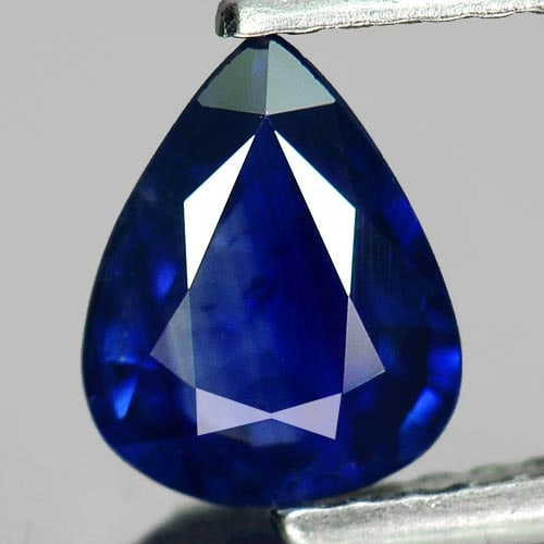 Natural Blue Sapphire 0.92 Ct. VS Pear Shape 7.6 x 6 Mm. Gemstone From Thailand: Product ID: 806008682 Product Name: Natural Blue Sapphire Weight: 0.92 CT. Size: 7.6 x 6 x 2.7 MM. Shape: Pear Color: Blue Clarity:VS Luster: Very Good Gems Origin: Thailand Treatment: Heated Crystal 