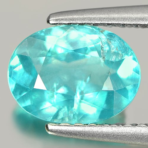 Natural Paraiba Color Apatite 1.30 Ct. Oval Shape 8.1 x 6.1 Mm. Gemstone From Tanzania: Product ID: 800605222 Product Name: Natural Apatite Weight: 1.30 CT. Size: 8.1 x 6.1 x 3.8 MM. Shape: Oval Color: Neon Blue Clarity:SI Luster: Good Gems Origin: Tanzania Treatment: Unheated Crystal St