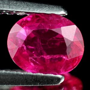 Natural Unheated Purplish Pink Ruby 0.60 Ct. Oval Shape 6.4 x 5.2 Mm. Gemstone From Tanzania: Product ID: 805927003 Product Name: Natural Ruby Weight: 0.60 CT. Size: 6.4 x 5.2 x 2.1 MM. Shape: Oval Color: Purplish Pink Clarity:VSI Luster: Good Gems Origin: Tanzania Treatment: Unheated Crystal 